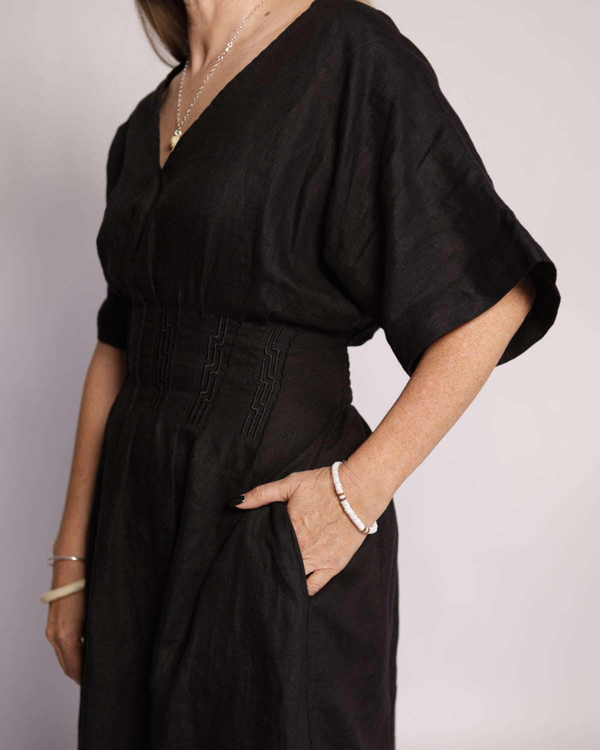 Winnie black linen maxi dress – bodice and shirred waist detail with pocket
